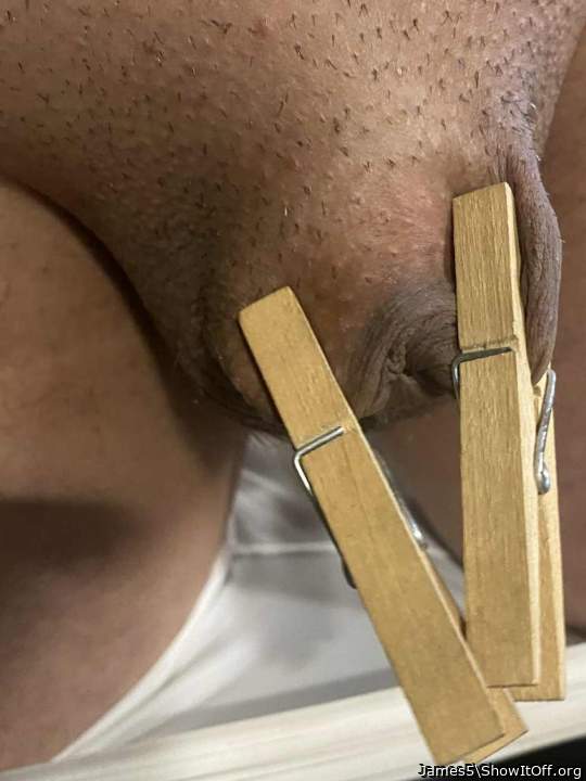 Held back by pegs.