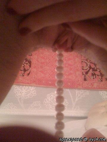 My tight cunt with aroused clit grips onto pearl necklace