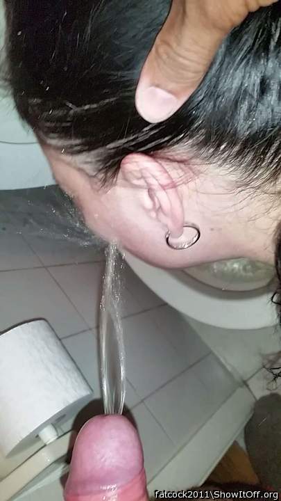 holding my wife's head so he can piss in her mouth & face