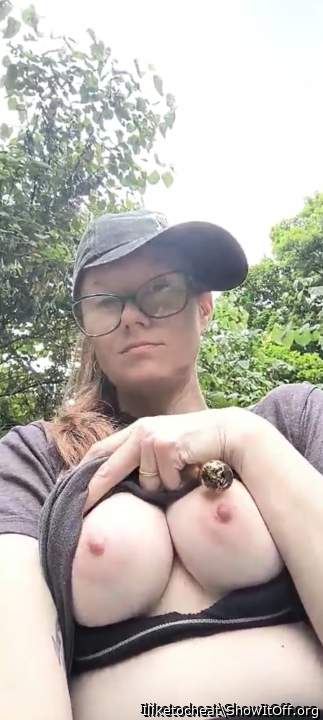 At a cemetery flashing my titties at strangers