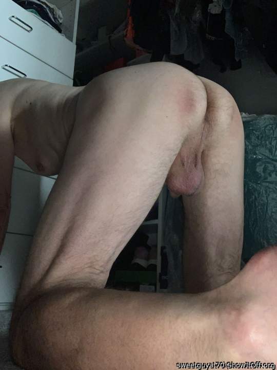 On hands and knees in the closet