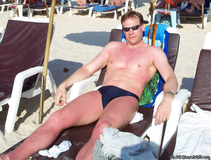 enjoying the beach in my speedo