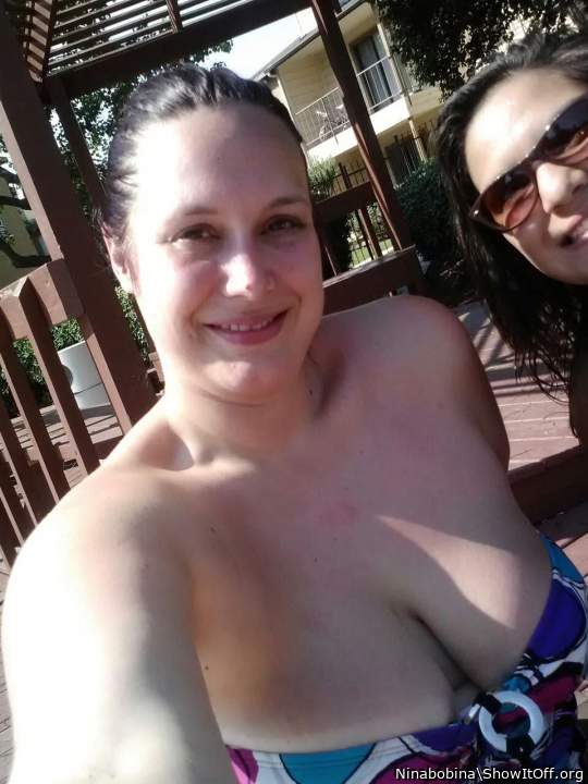 Go ahead and pull those big titties out and show them off 