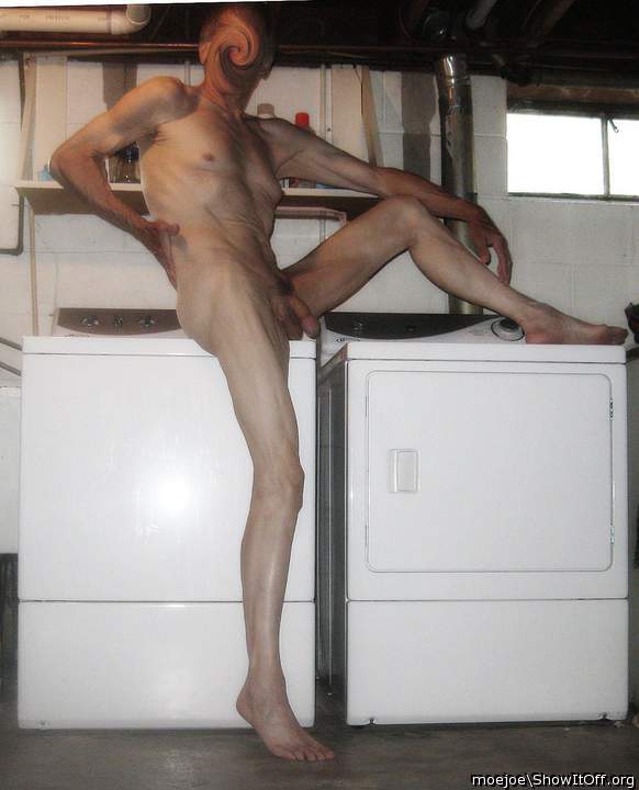 Doing the laundry....naked....