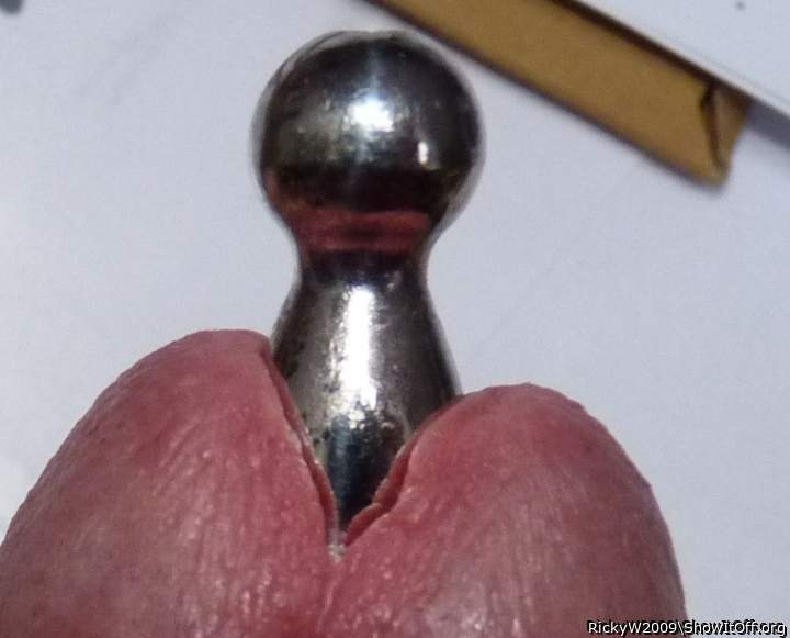 Awesome cock plugging or sounding.     