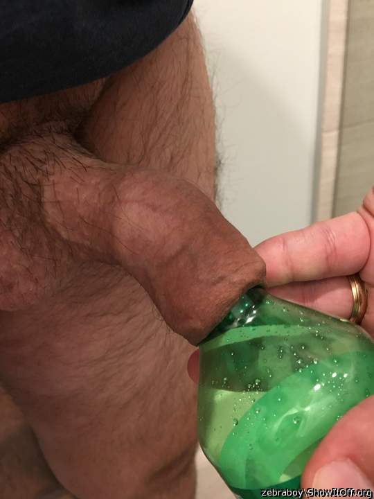 Trying to twist off the top...