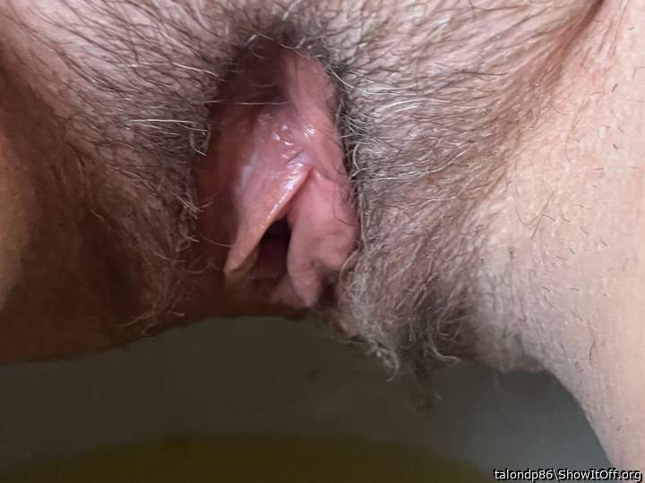 Beautiful pussy! Love to taste how wet it is! Love the bush!