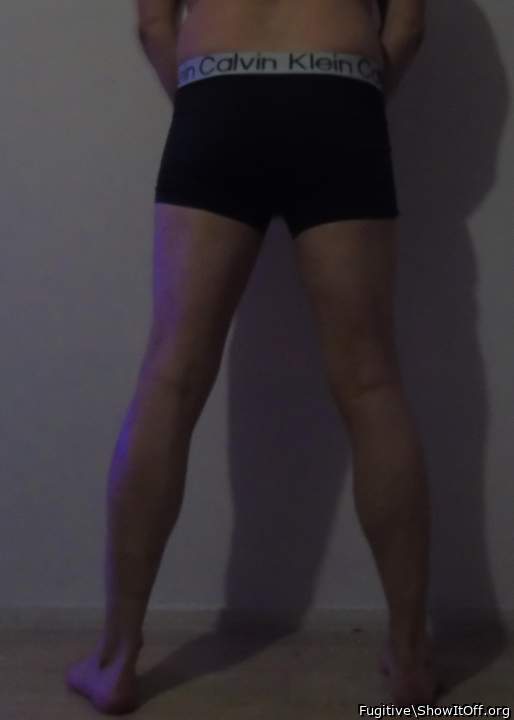 My back, standing against wall in underwear