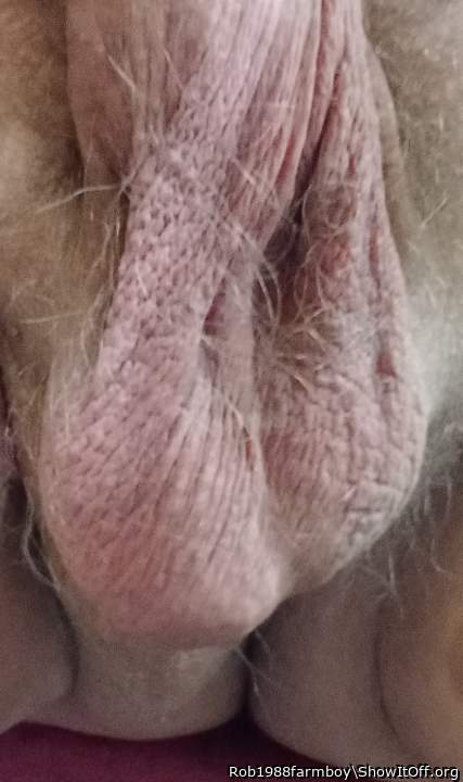 Hanging down a little